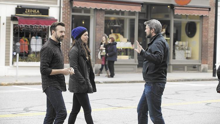 "Tumbledown" stars Jason Sudeikis, left, and Rebecca Hall talk with director Sean Mewshaw during a film shoot in Concord, Mass. The indie movie's budget was roughly $4 million. (Seacia Pavao)